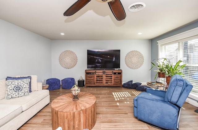 living room with ceiling fan