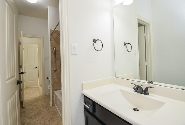 bathroom with vanity, tile patterned flooring, and tub / shower combination