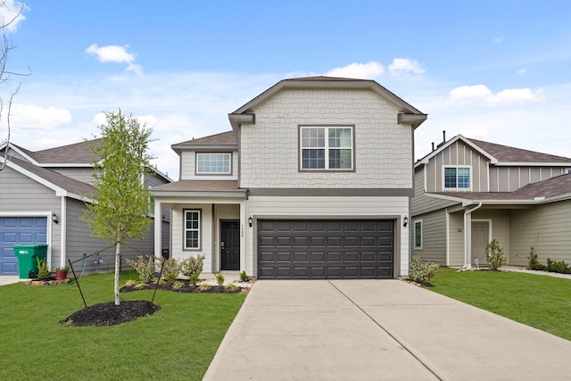 view of front facade featuring driveway, a garage, and a front lawn