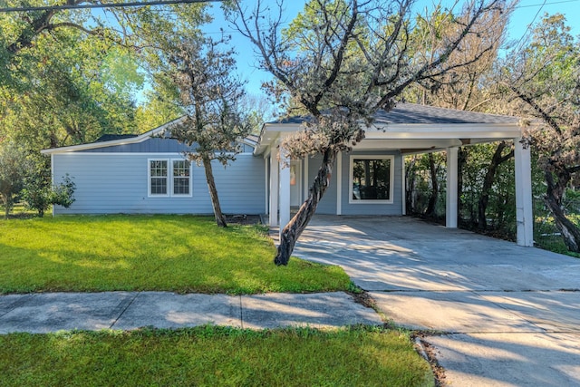 single story home with a carport and a front yard