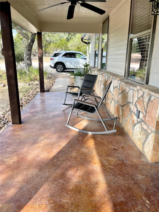 view of patio / terrace featuring ceiling fan and covered porch