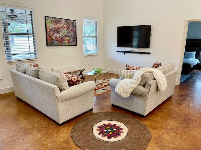 living room with concrete flooring