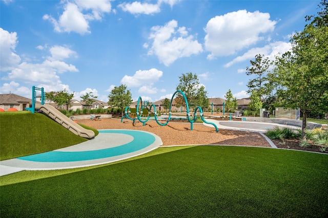 view of playground featuring a lawn