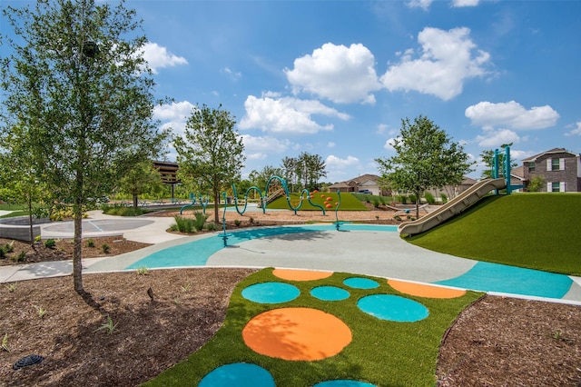 exterior space featuring a playground and a lawn