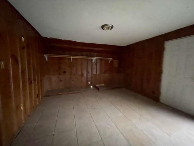 basement with wood walls