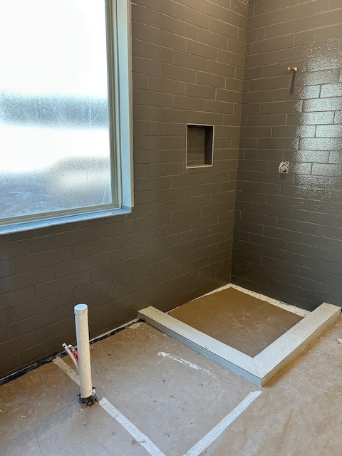 4423 Southpoint Way, Fulshear, TX 77441 - full bathroom featuring a tile shower