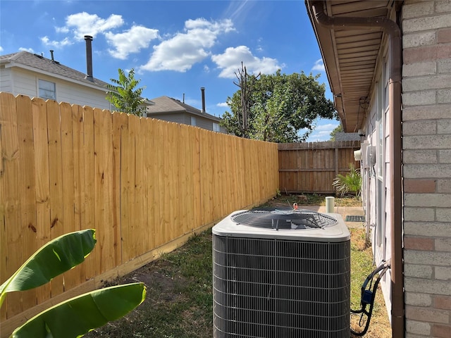 view of yard with central air condition unit