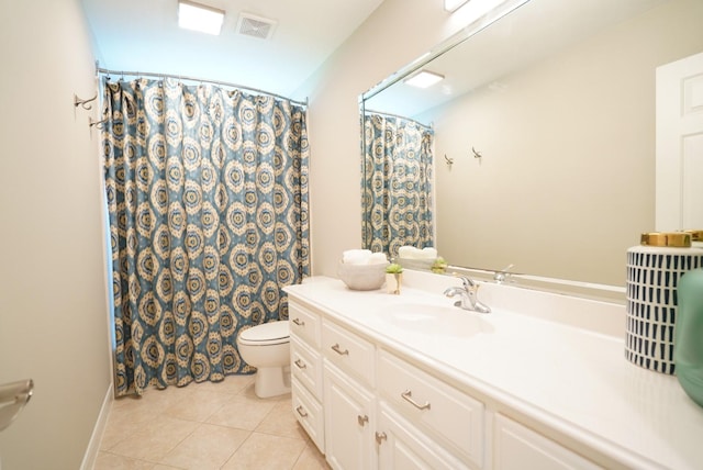 bathroom featuring tile patterned floors, toilet, a shower with shower curtain, and vanity