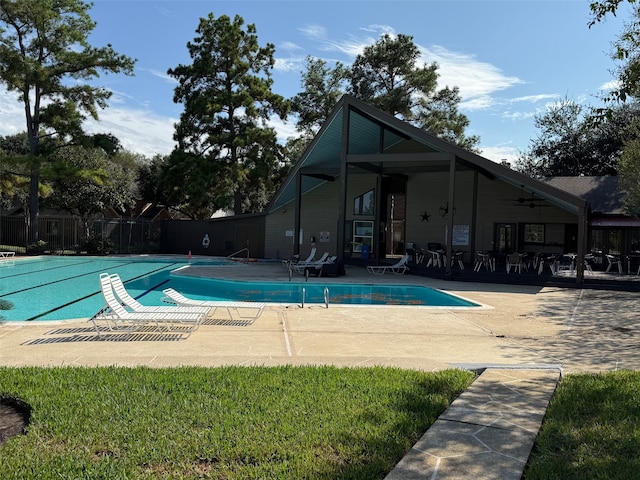 view of swimming pool featuring a patio area