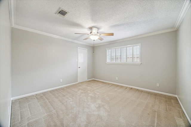 spare room with light carpet, ornamental molding, and ceiling fan