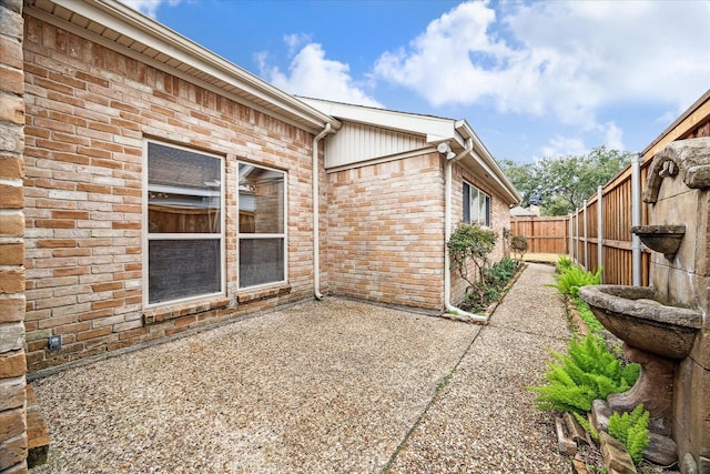 view of home's exterior with a patio