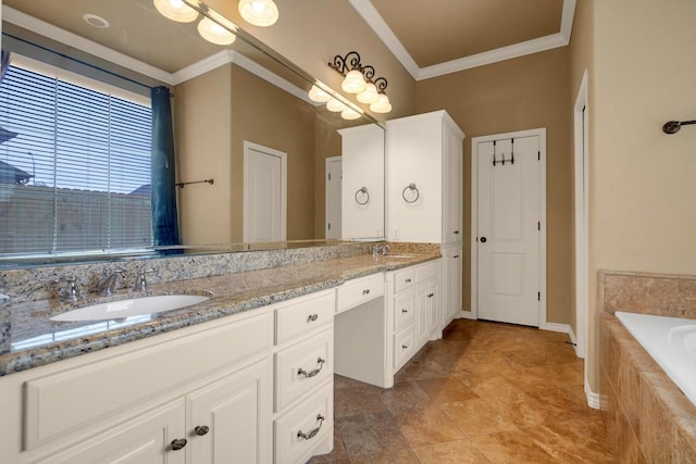 bathroom with tiled tub, crown molding, and vanity