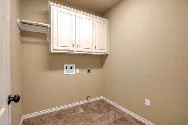 laundry room with washer hookup, electric dryer hookup, and cabinets