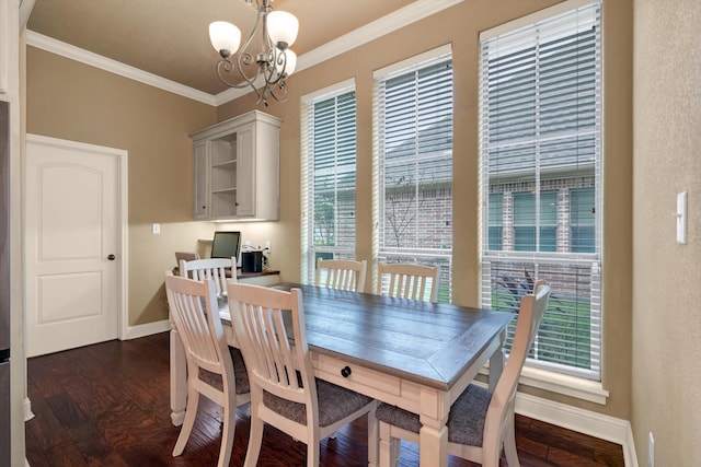 dining space featuring an inviting chandelier, dark hardwood / wood-style flooring, and ornamental molding