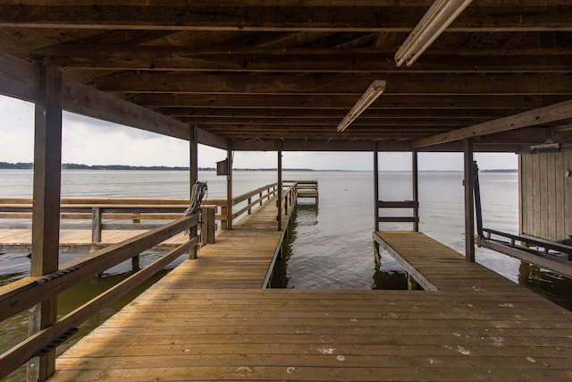 view of dock with a water view