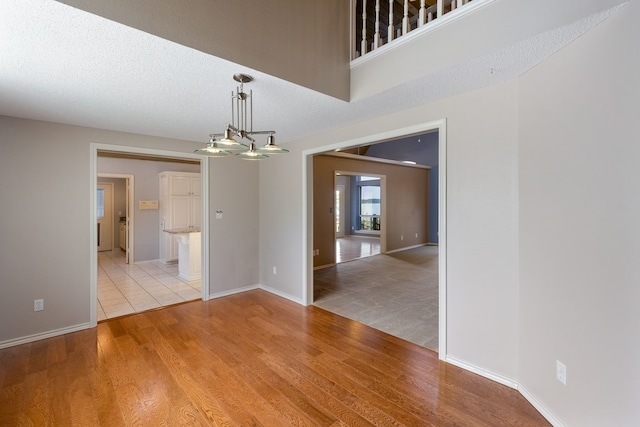 unfurnished dining area featuring light hardwood / wood-style flooring