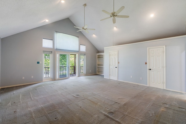 interior space featuring high vaulted ceiling and ceiling fan