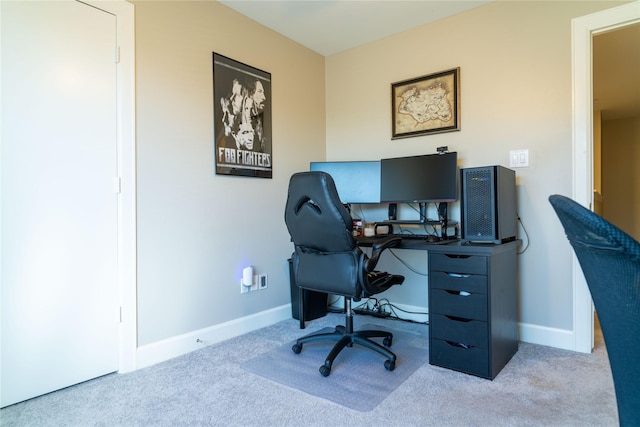 office space with light colored carpet