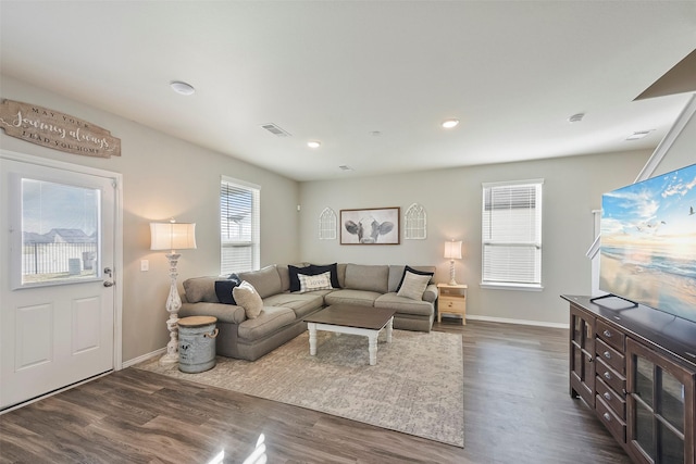 living room with dark hardwood / wood-style floors