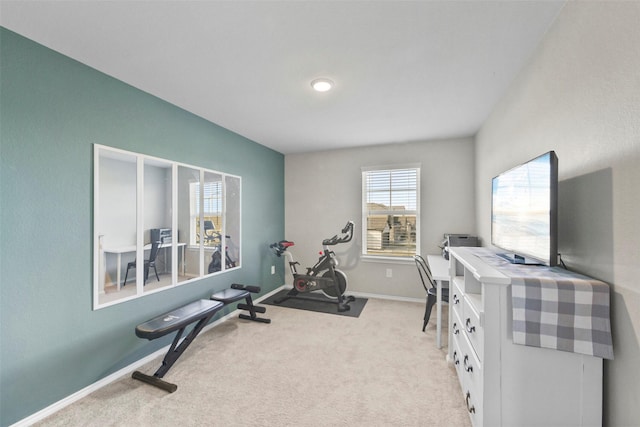 workout area with light colored carpet