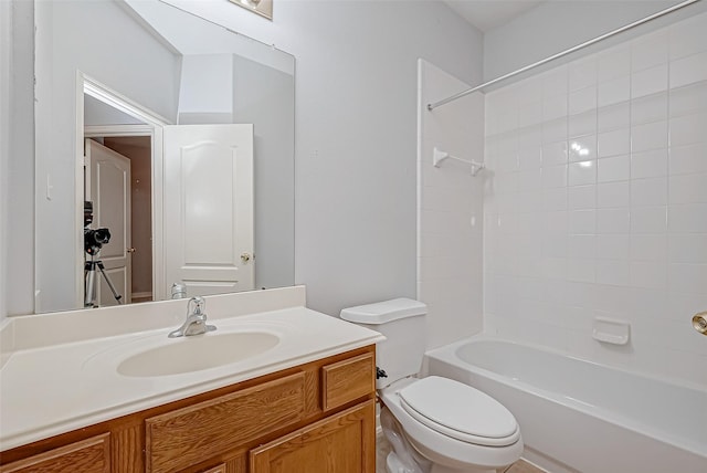 full bathroom with vanity, tub / shower combination, and toilet