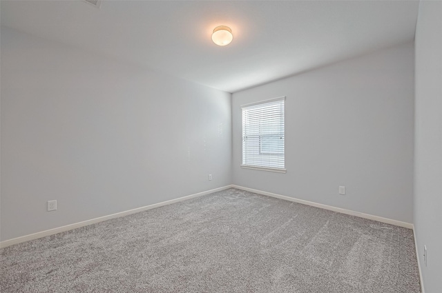 spare room with carpet flooring