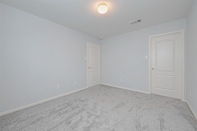 empty room featuring carpet floors