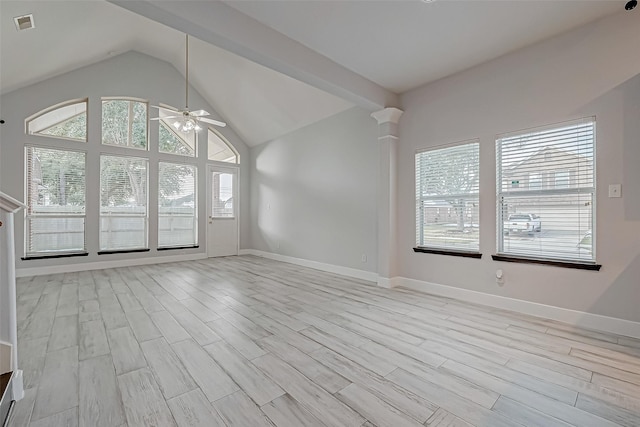 interior space with ceiling fan, lofted ceiling, and light hardwood / wood-style floors