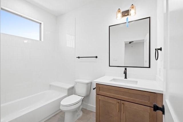 full bathroom with vanity, tiled shower / bath combo, tile patterned floors, and toilet