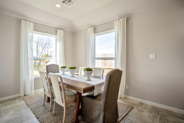 dining area featuring plenty of natural light