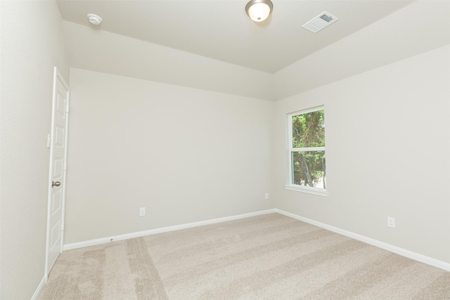 empty room with light colored carpet