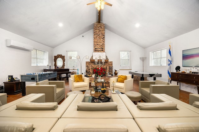 living room with a wall mounted air conditioner, hardwood / wood-style flooring, vaulted ceiling, and a brick fireplace