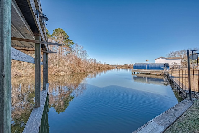 dock area featuring a water view