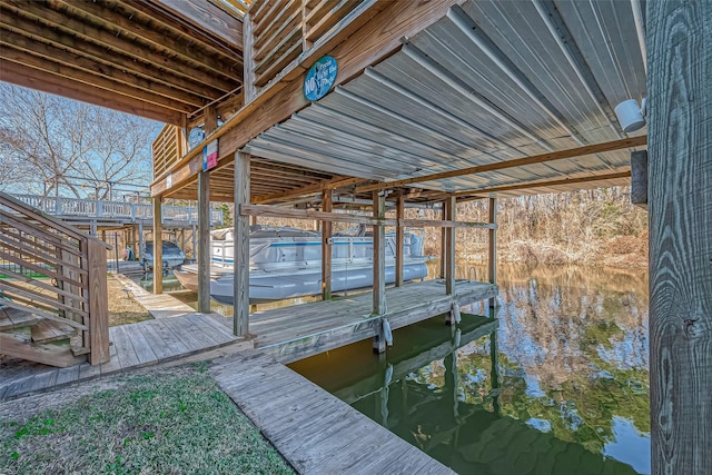 view of dock with a water view