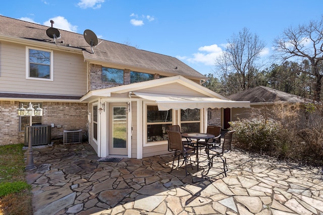 view of patio featuring cooling unit