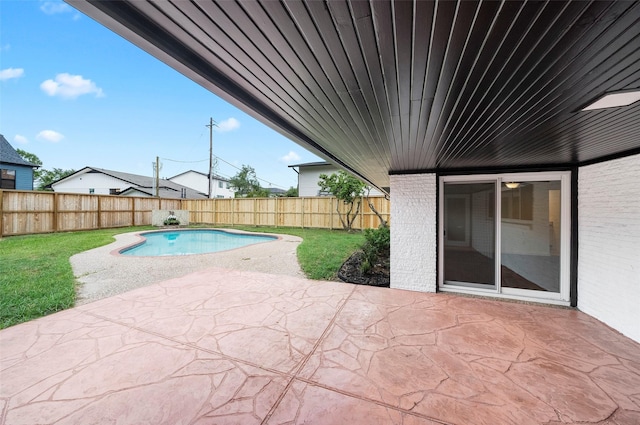 view of patio featuring a fenced in pool