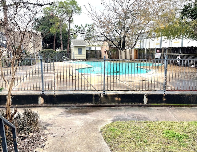 view of swimming pool featuring a patio area