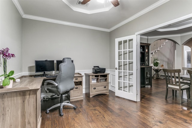 office space featuring ornamental molding, ceiling fan, and dark hardwood / wood-style flooring