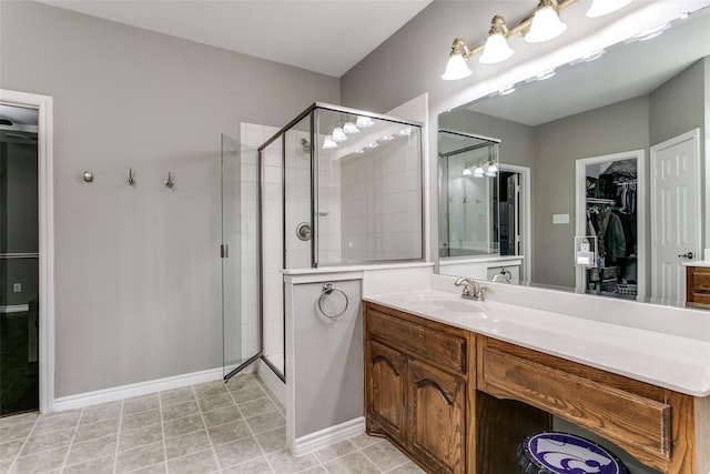 bathroom featuring vanity and walk in shower