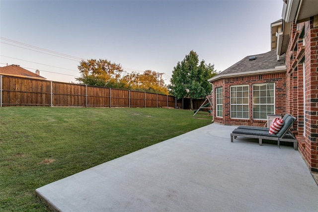 view of yard with a patio area