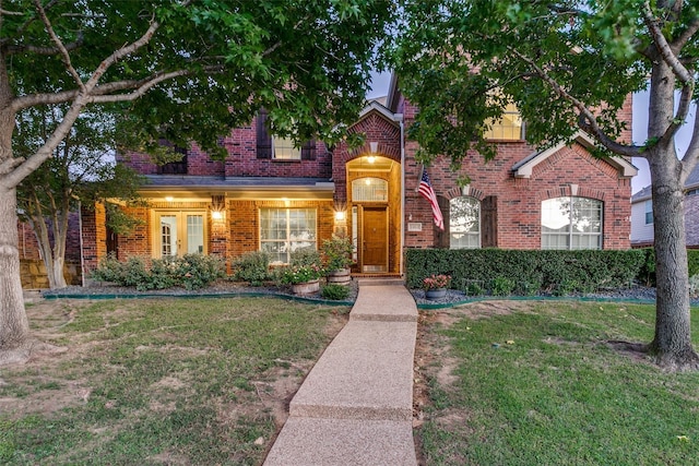 view of property with a front lawn