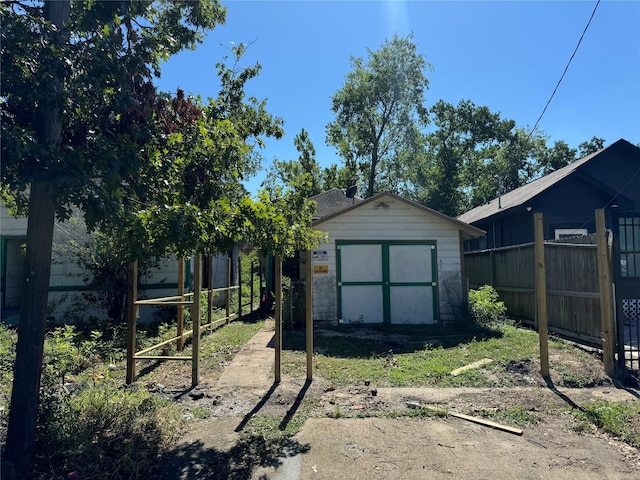 exterior space with a shed