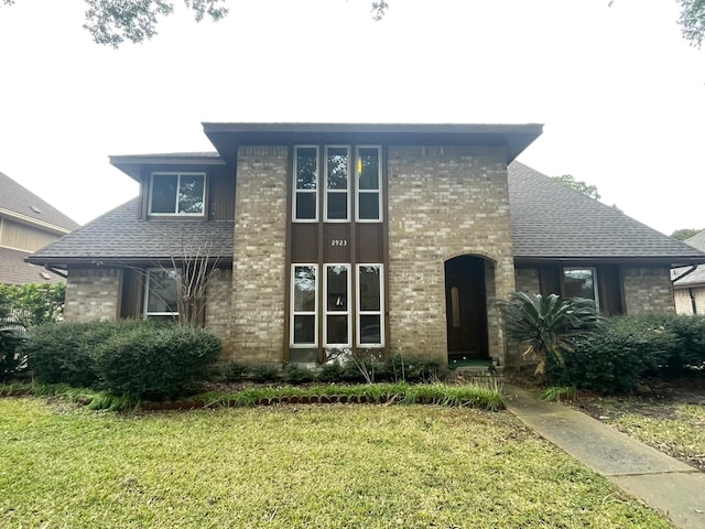 view of front of home with a front yard