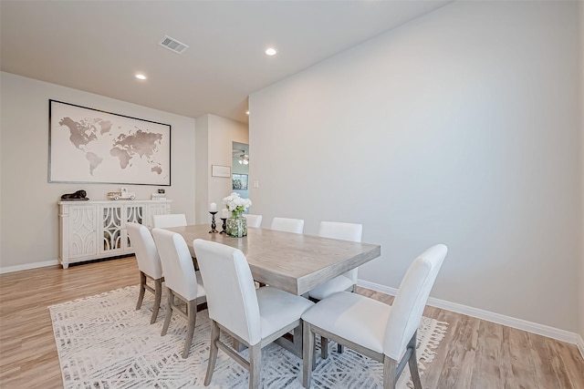 dining room with light wood-type flooring