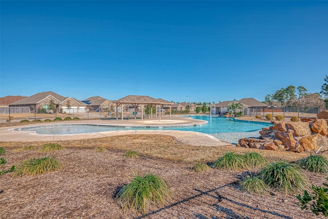 view of swimming pool with a gazebo