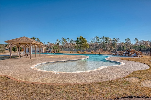 view of swimming pool featuring a gazebo and a patio