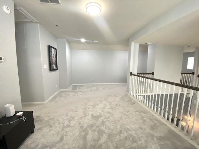 unfurnished room with carpet floors