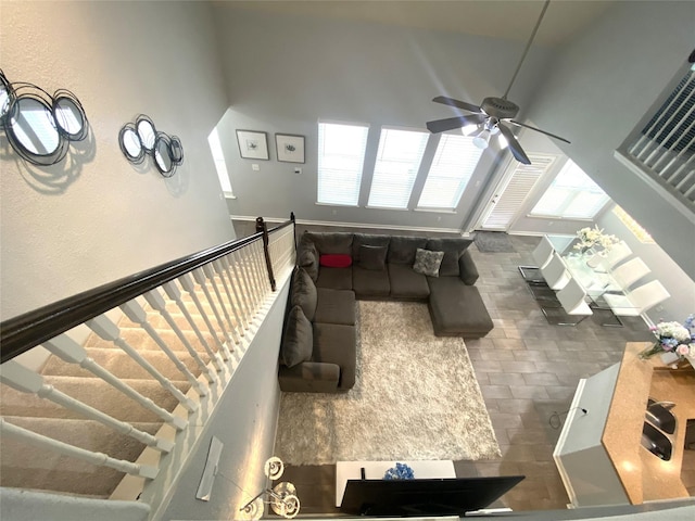 living room featuring ceiling fan