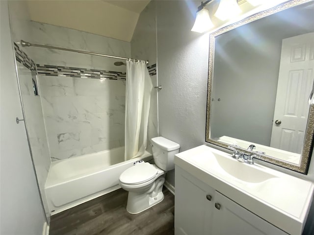 full bathroom with shower / bath combination with curtain, wood-type flooring, toilet, and vanity