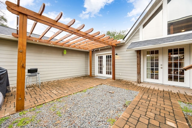 view of patio / terrace with french doors and a pergola